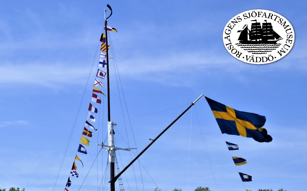 Elviras mast med svenska flaggan samt stort flaggspel under Nationaldagen.