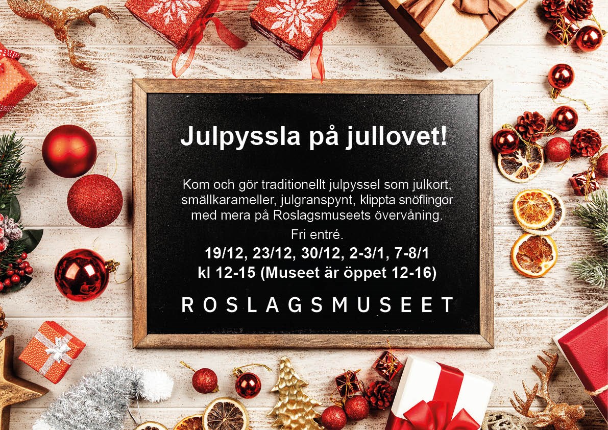Juldekorationer och en svart tavla med text